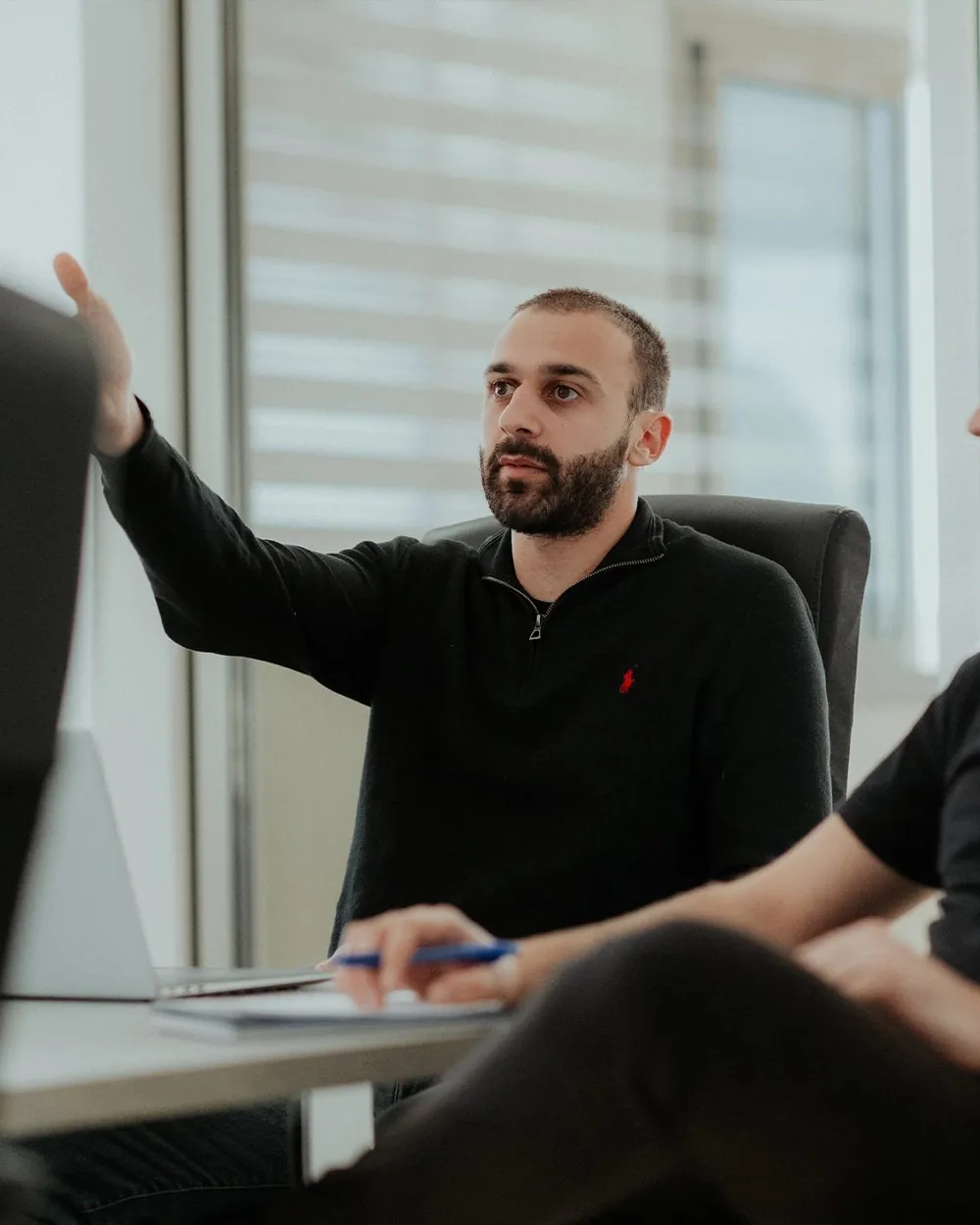 Two members of The Obsidian Co. team reviewing an ecommerce account together on screen.